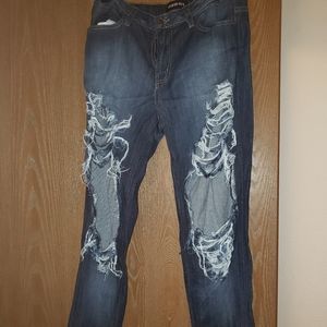 Ripped Jeans Never worn w/o tag. Size 7/8.